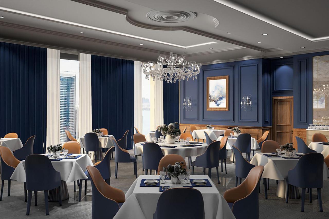 The Bentley Luxury Hotel & Suites Doha Eksteriør billede The interior of the restaurant